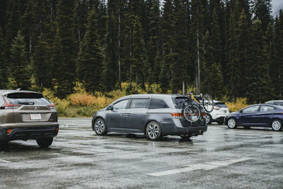 a couple of cars parked in a parking lot