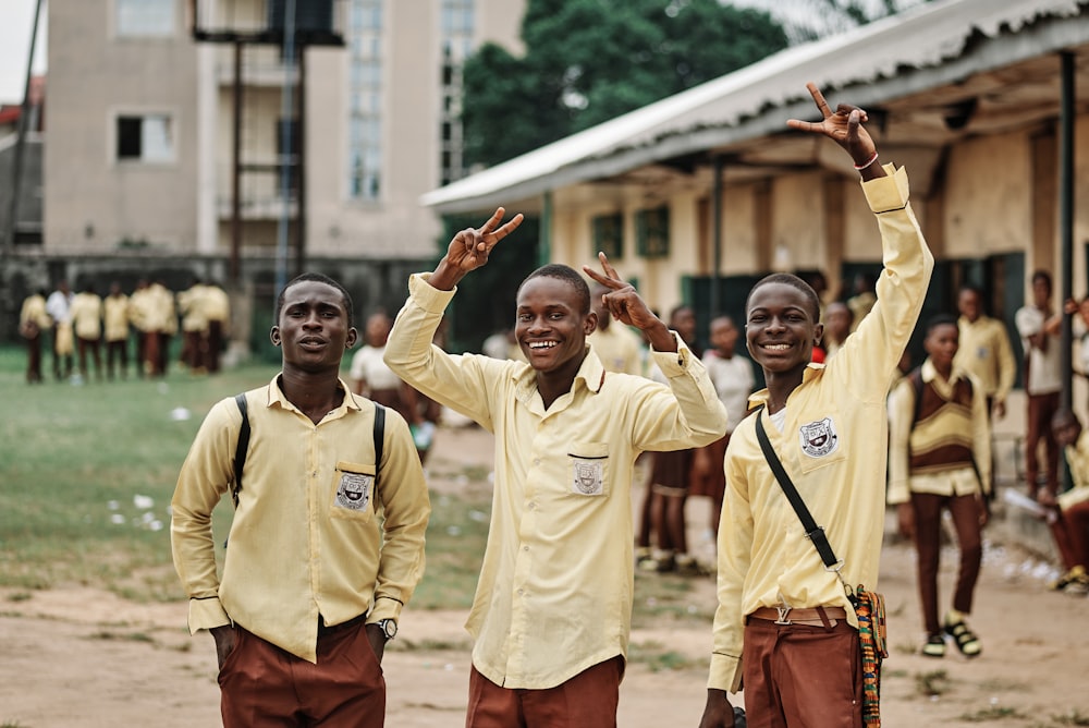 a group of young men standing next to each other