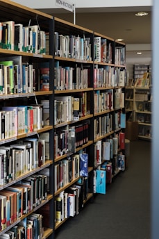 a long row of books in a library