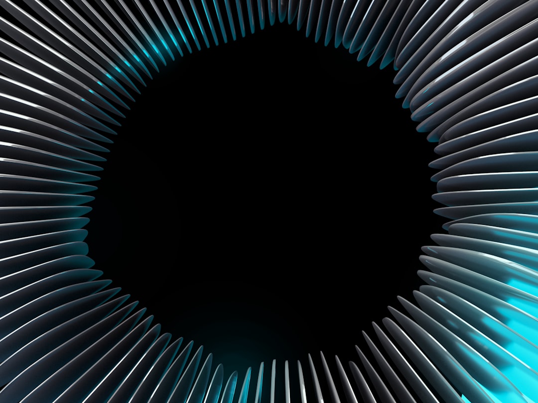a black and white photo of a circular object, Design by Fakurian.com</p>
<p style="text-align: left; margin-bottom: 1em;">