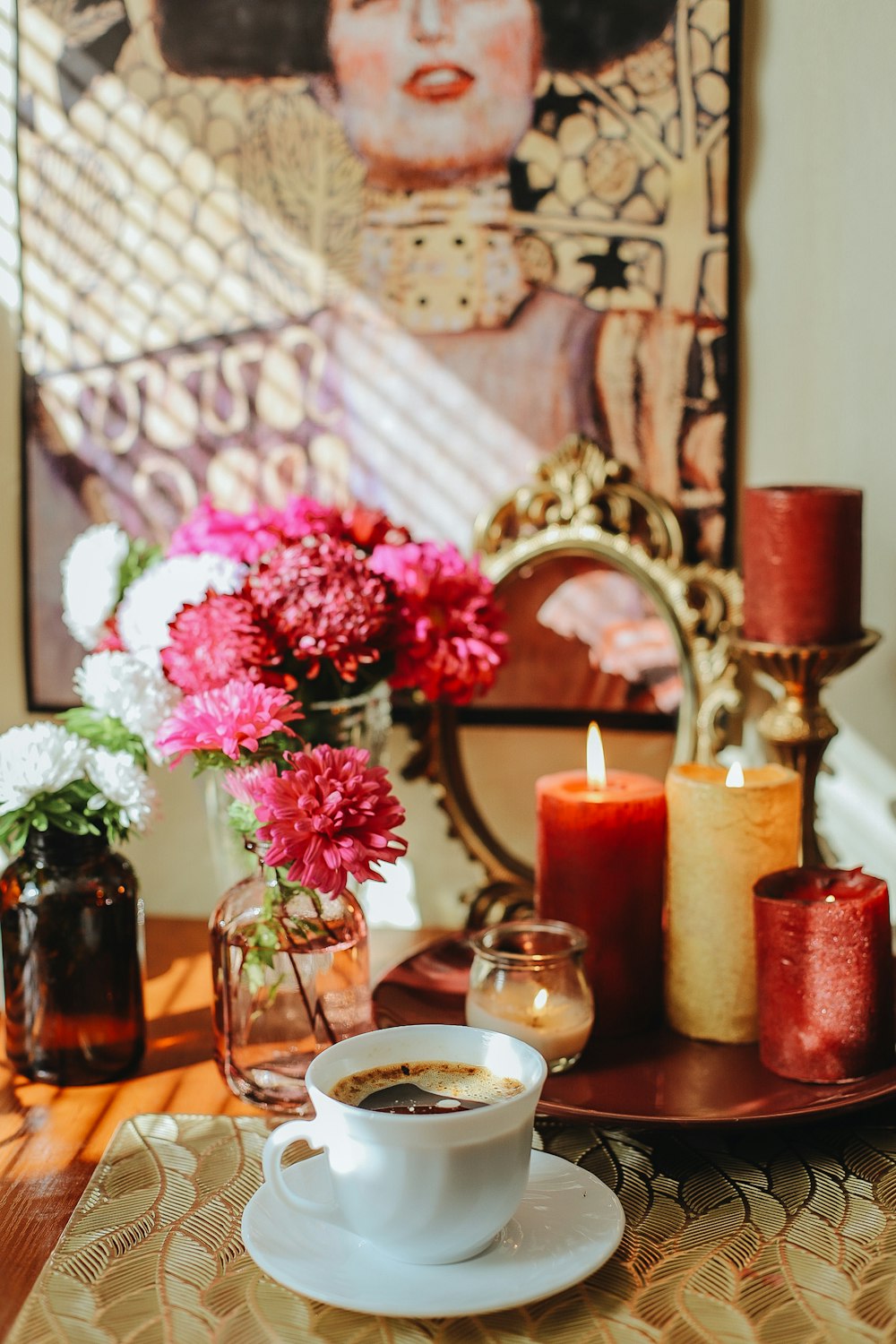 a cup of coffee sitting on top of a table