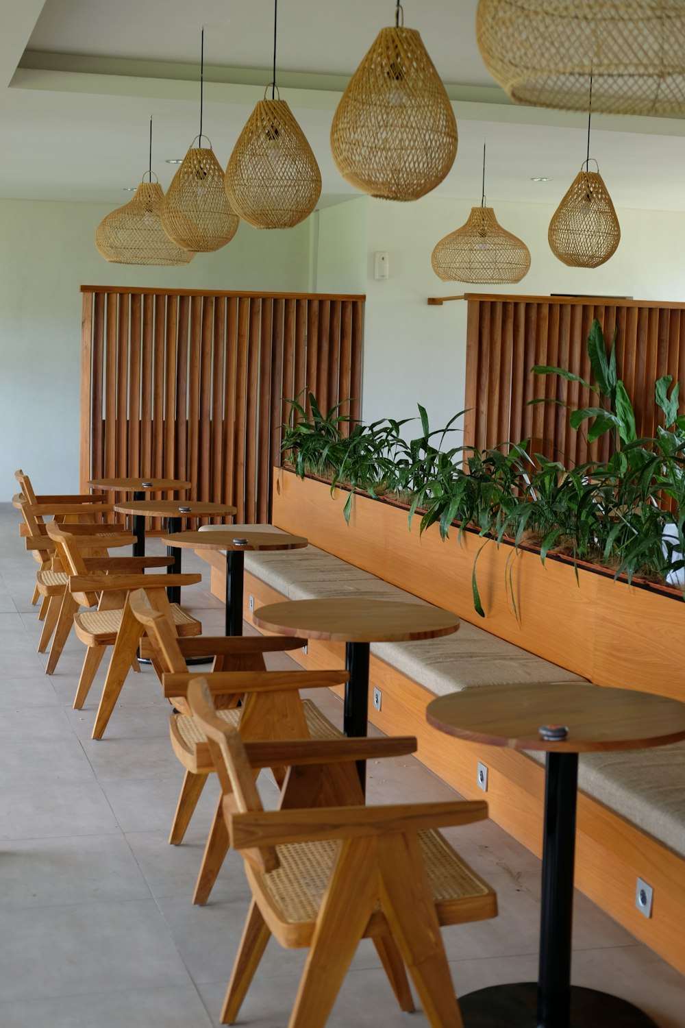 a row of wooden benches sitting next to each other