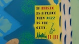 A colorful poster with the text 'If music is a place, then jazz is the city' in various fonts. The poster has illustrations of a saxophone, a city skyline, and decorative patterns in the background. The background is a bright mix of blue, green, and yellow with some abstract shapes.