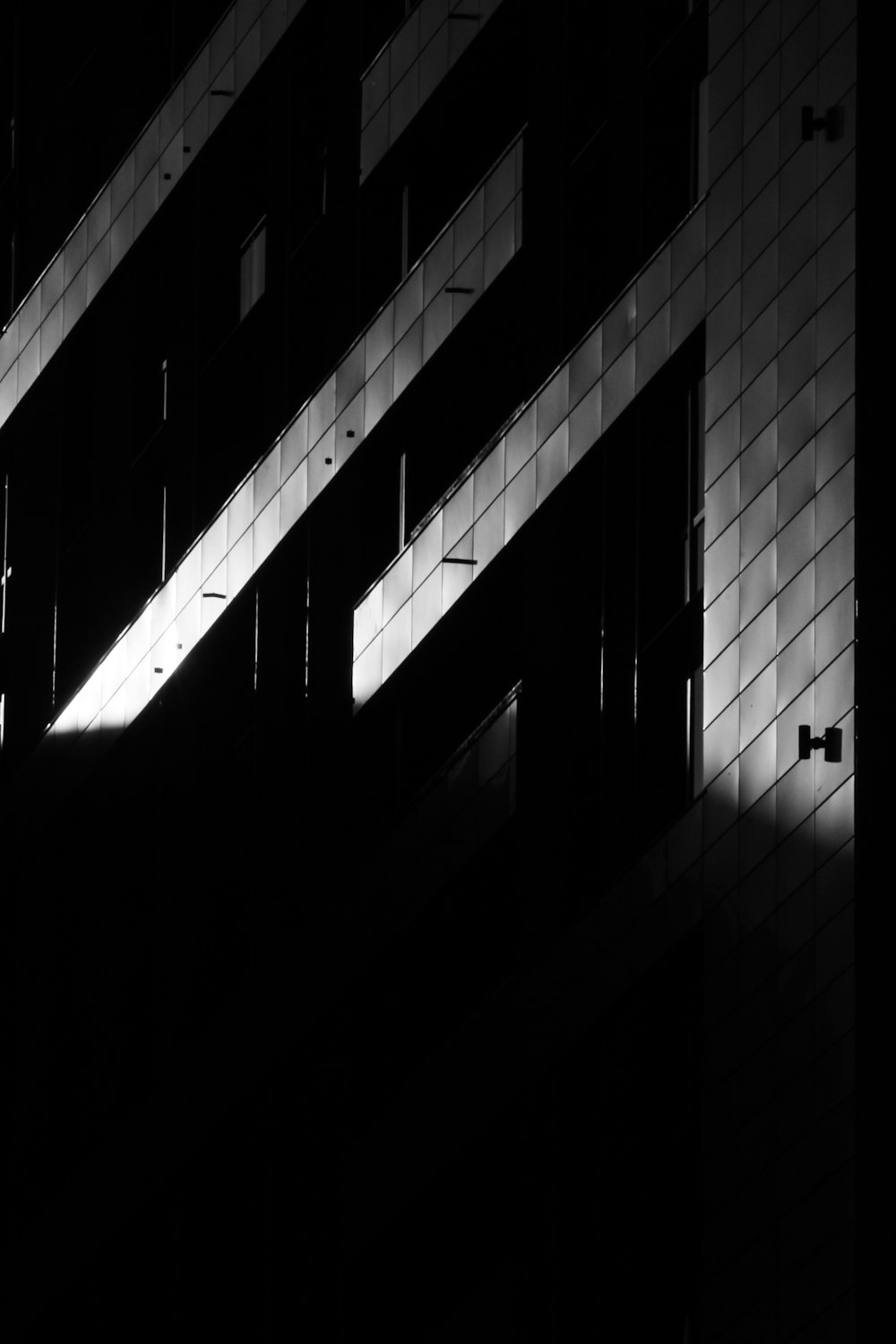 a black and white photo of some windows