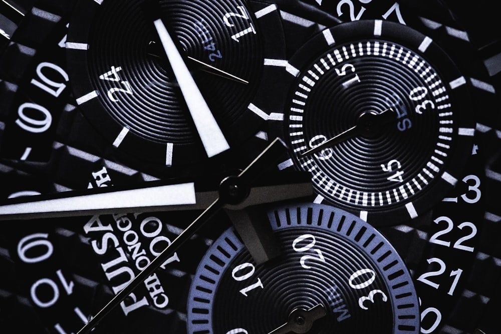 a close up of a watch face with numbers on it