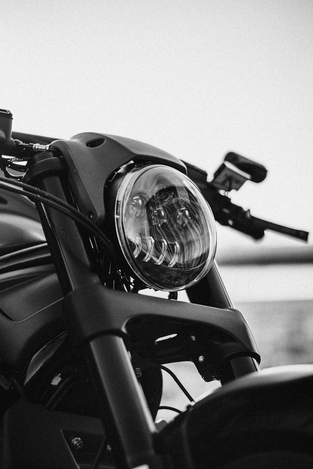 a black and white photo of a motorcycle