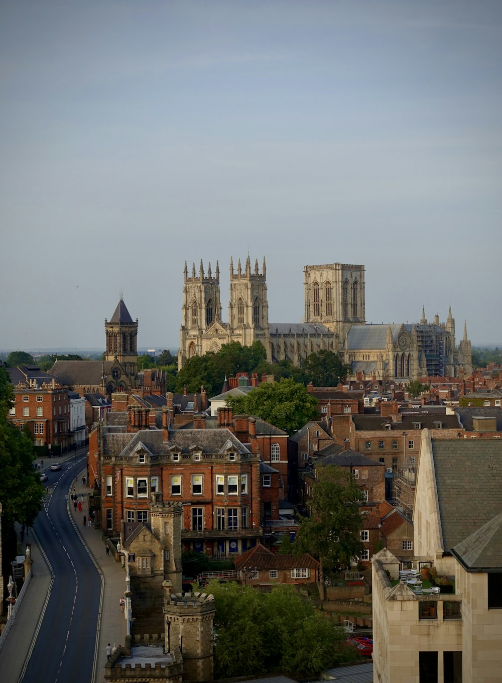 a view of a city with a cathedral in the background