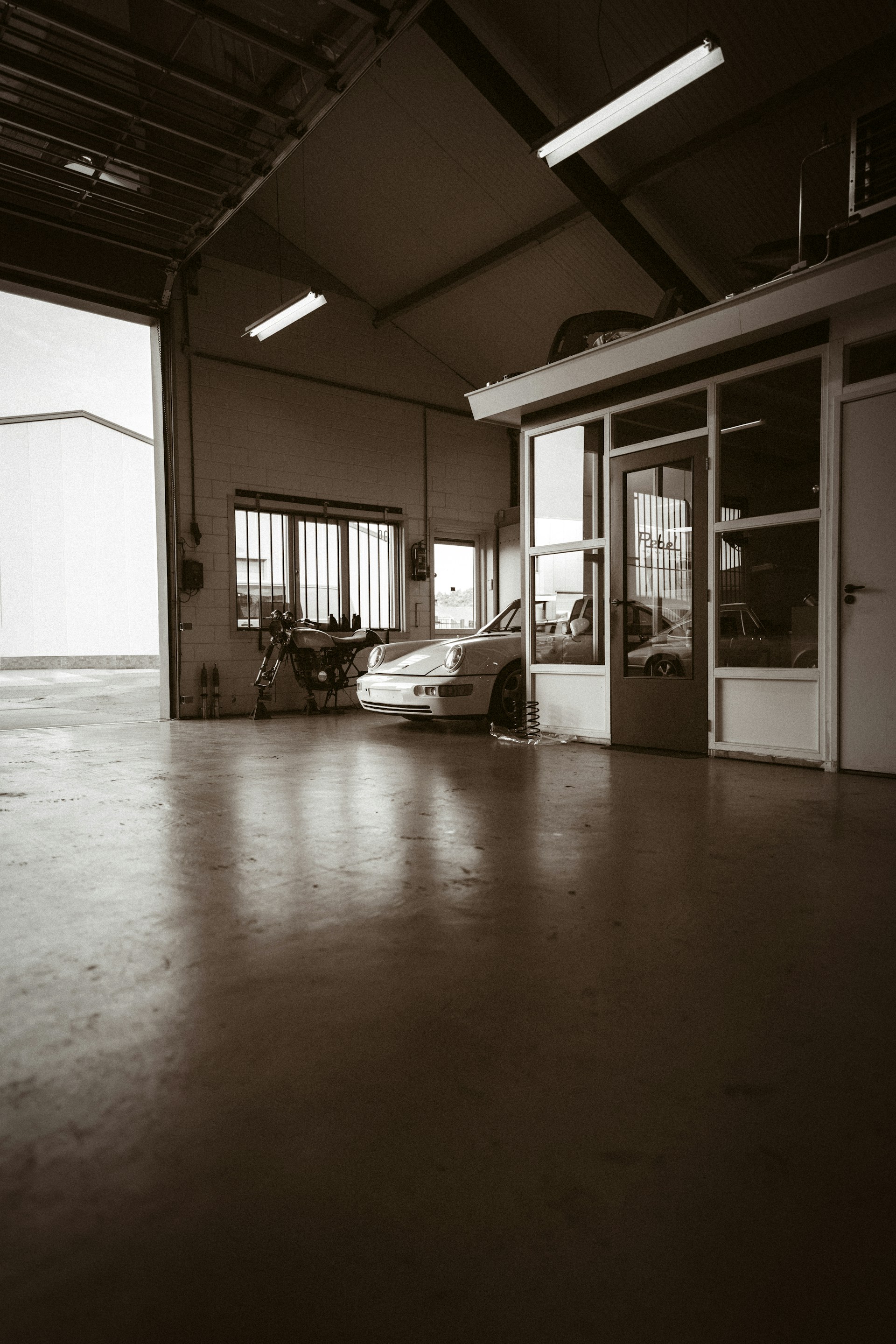 a car is parked inside of a garage