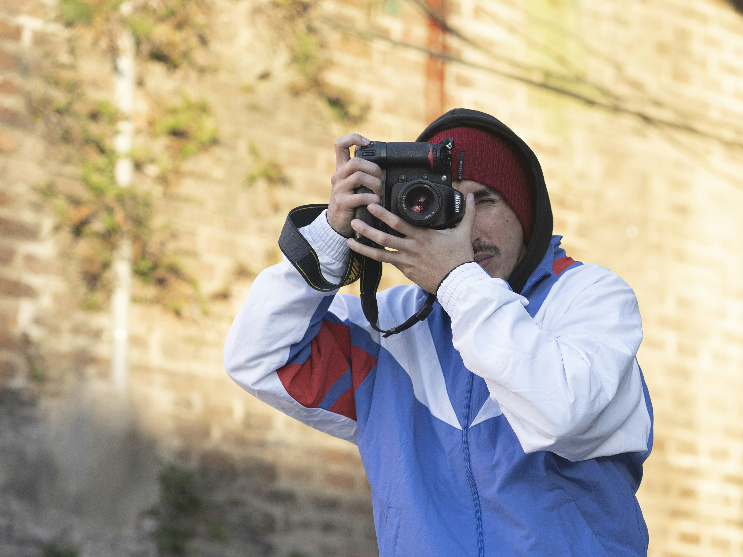 a man taking a picture with a camera