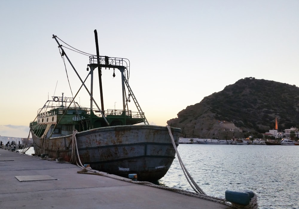 a boat sitting on top of a body of water