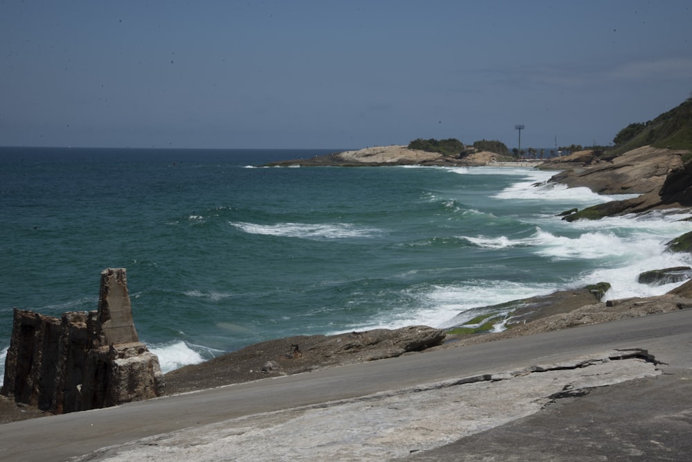 a view of a body of water from a cliff