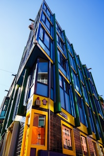 A panoramic shot of a modern commercial building constructed by eae construction limited under natural sunlight.