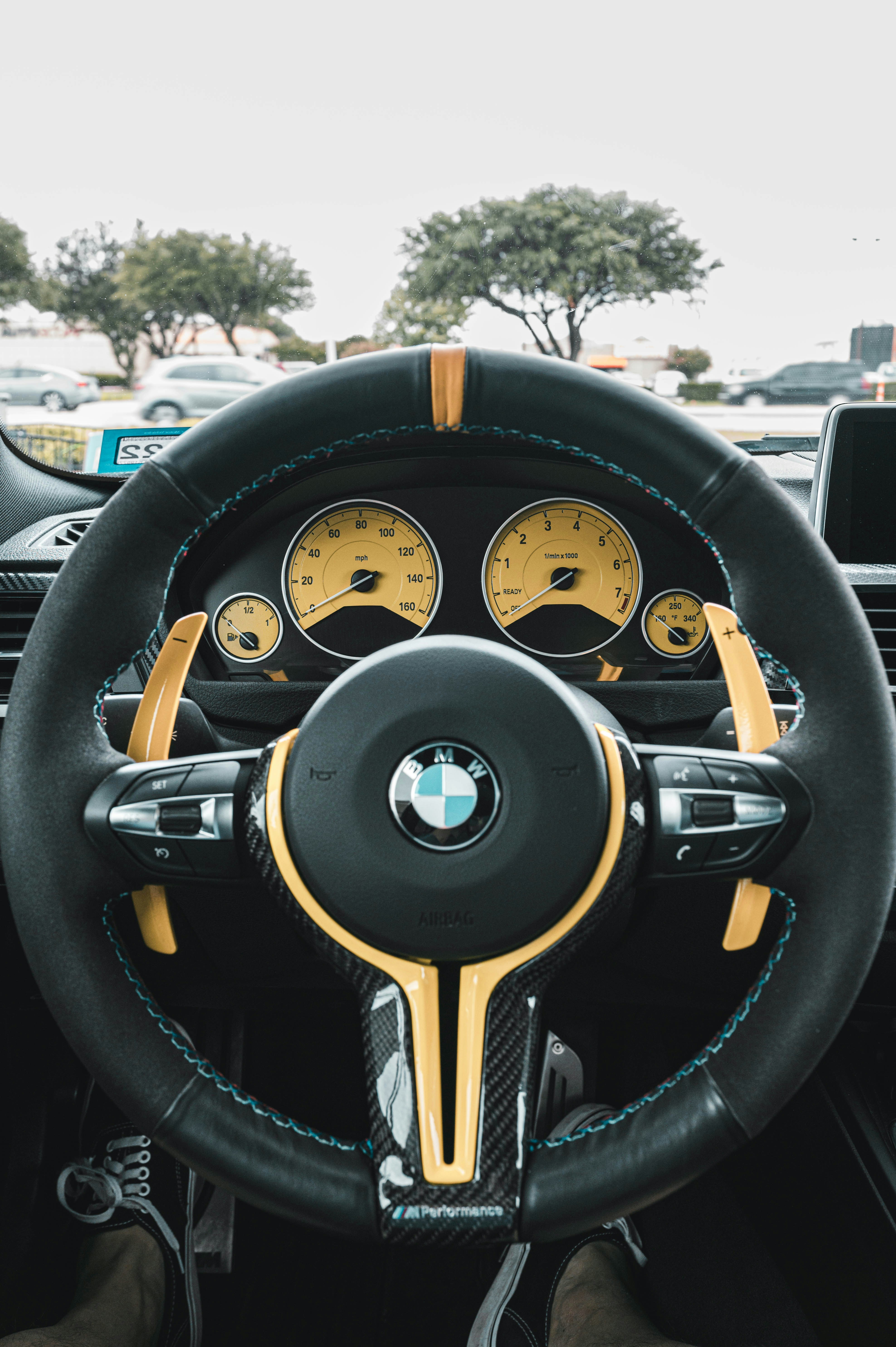 the interior of a car with a steering wheel