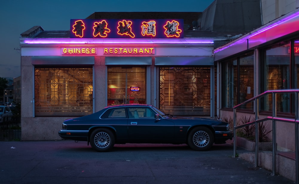 a car parked in front of a chinese restaurant