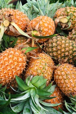 a pile of pineapples sitting next to each other