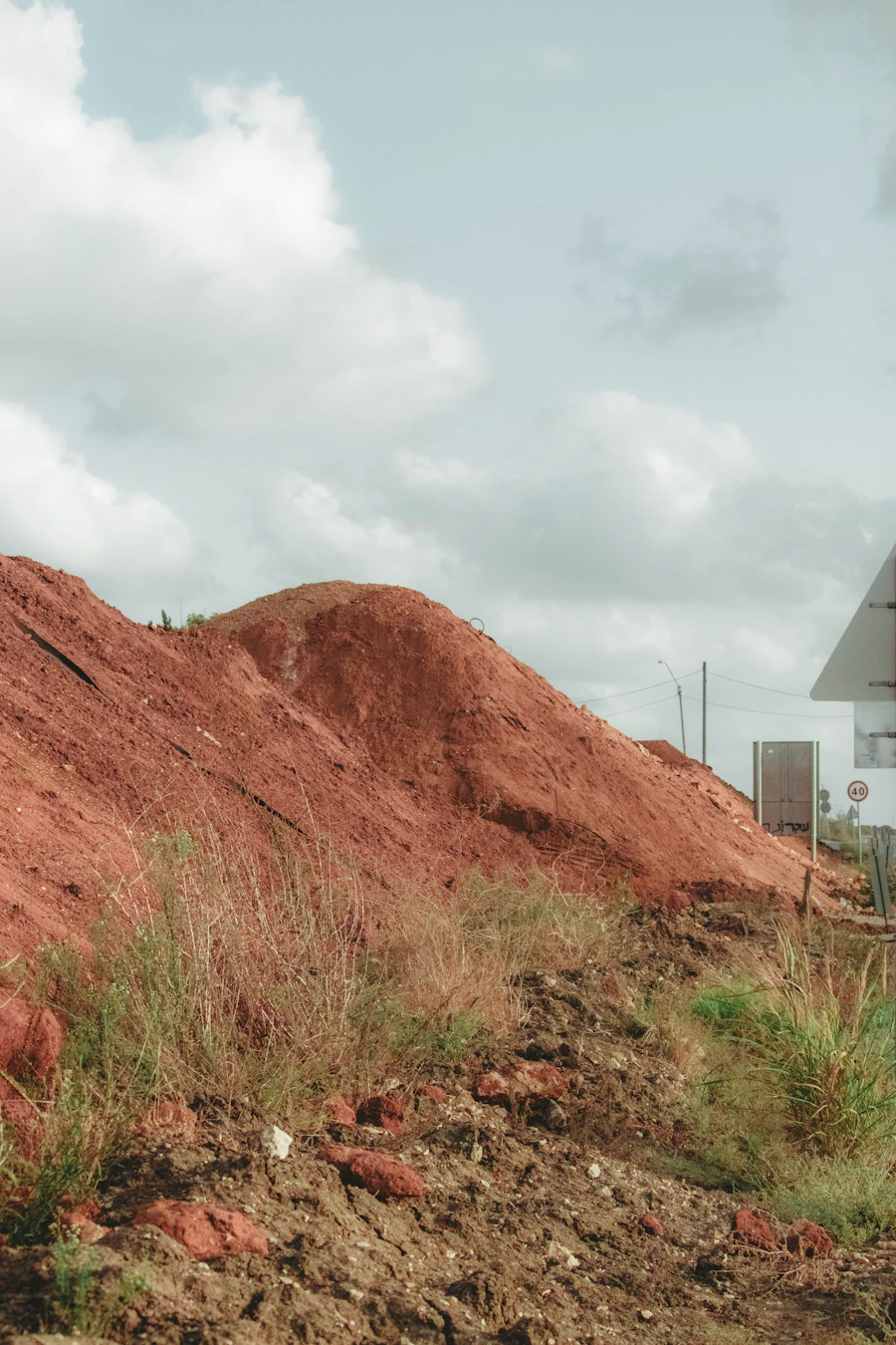 Pile of red earth used for filling and ground preparation