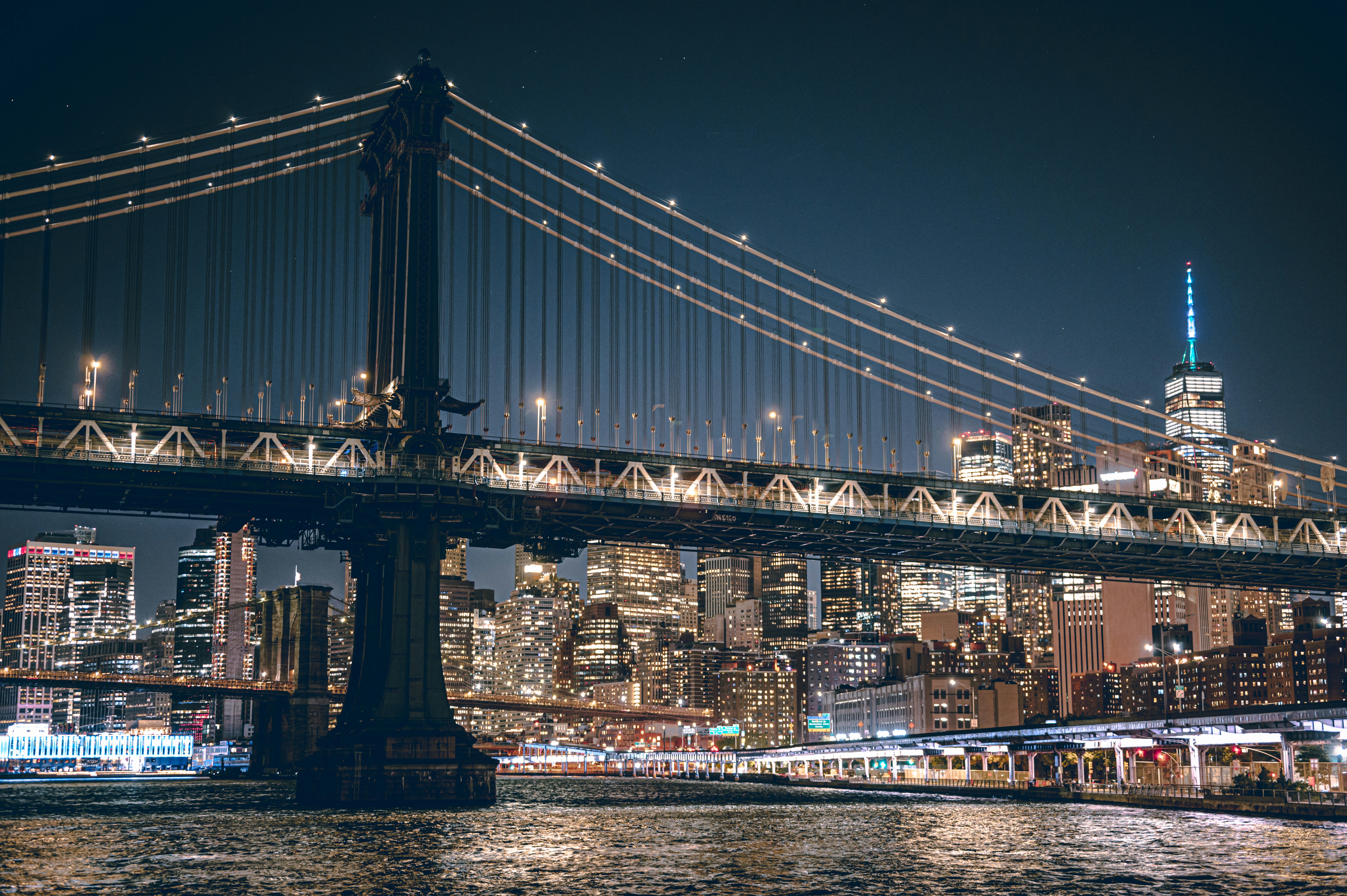 a view of a city at night from the water