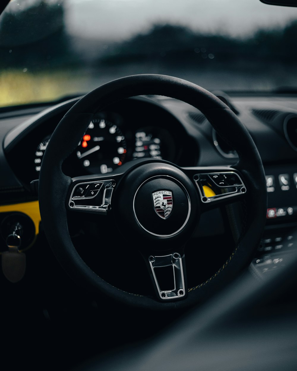 a steering wheel and dashboard of a car