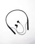 a pair of headphones sitting on top of a white surface