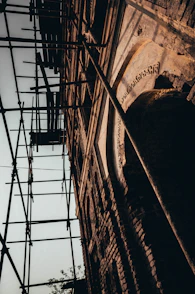 Team inspecting the facade details during rehabilitation work.