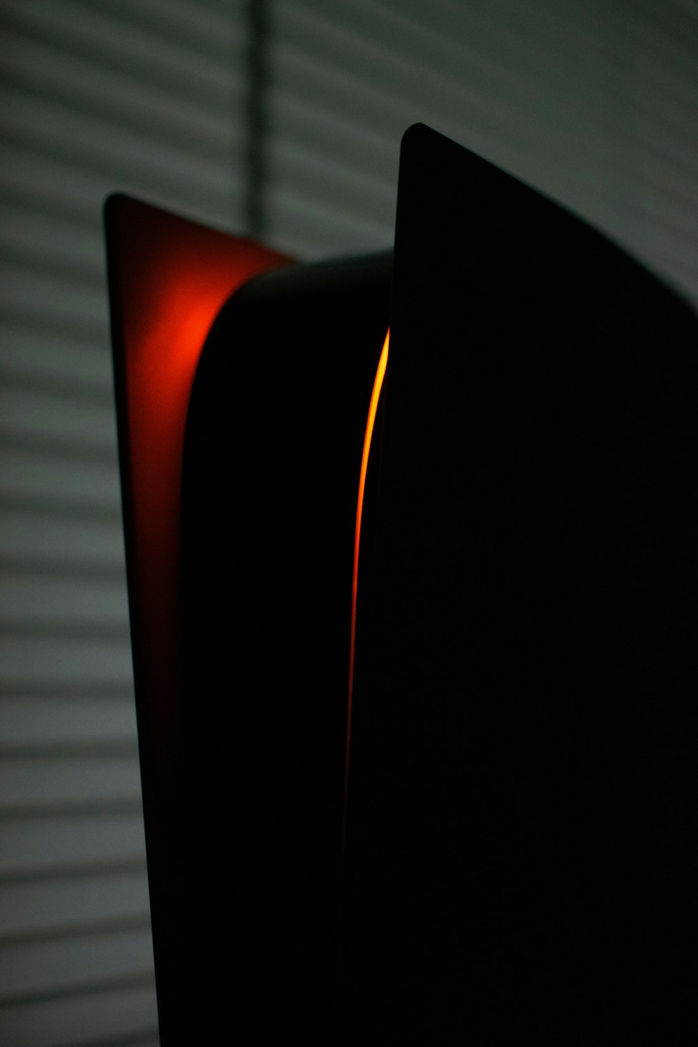 a close up of a traffic light in a dark room