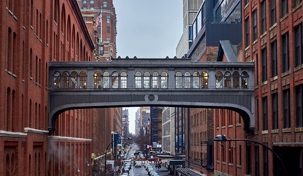 a bridge over a street in a city