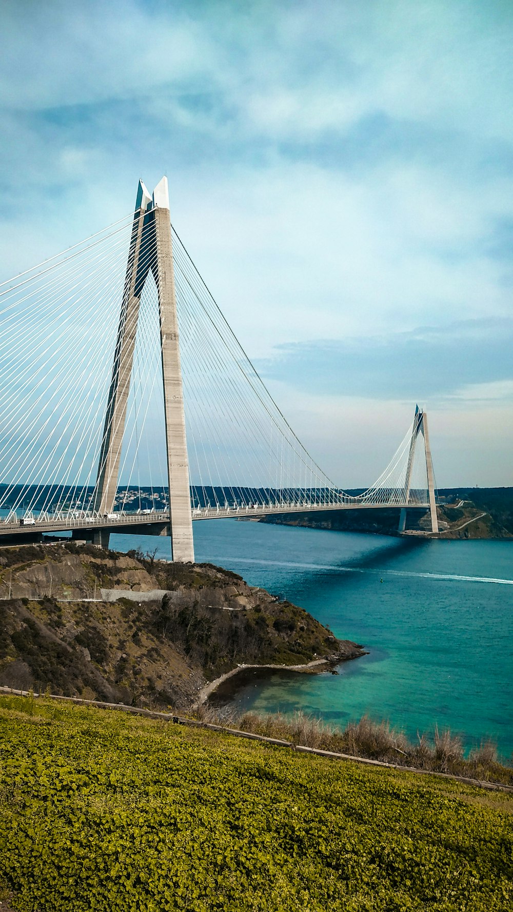 a large bridge spanning over a large body of water