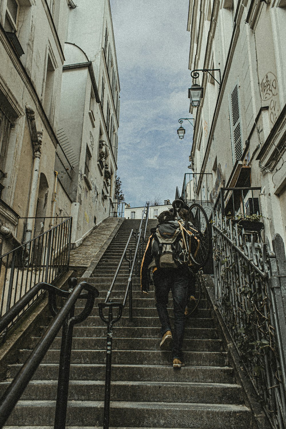 a man walking up a set of stairs