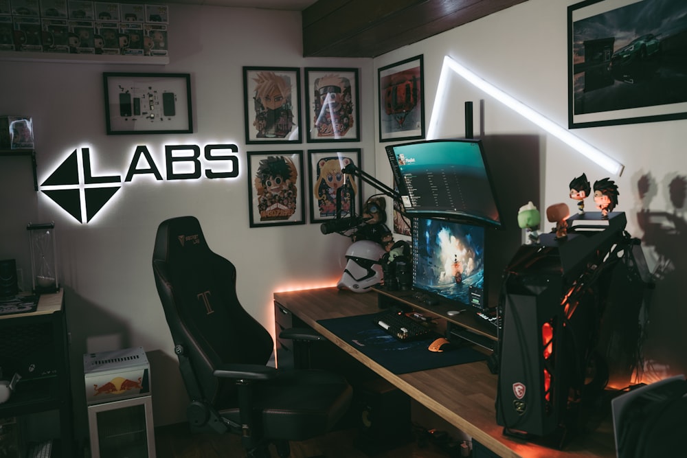 a computer desk with a monitor and keyboard