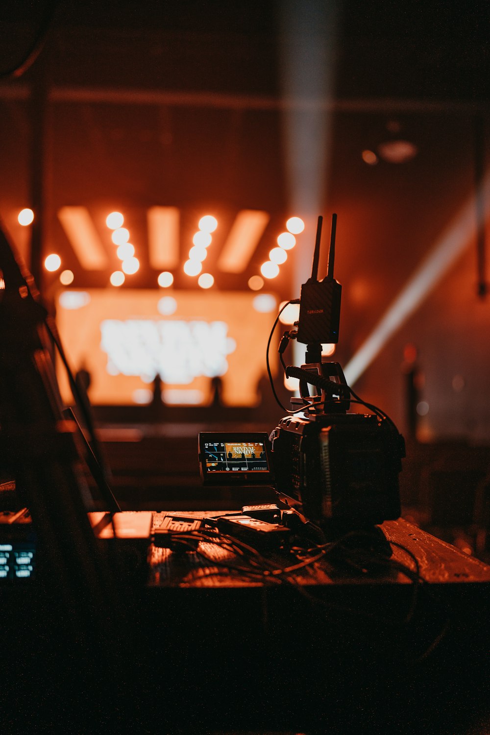 a camera sitting on top of a wooden table