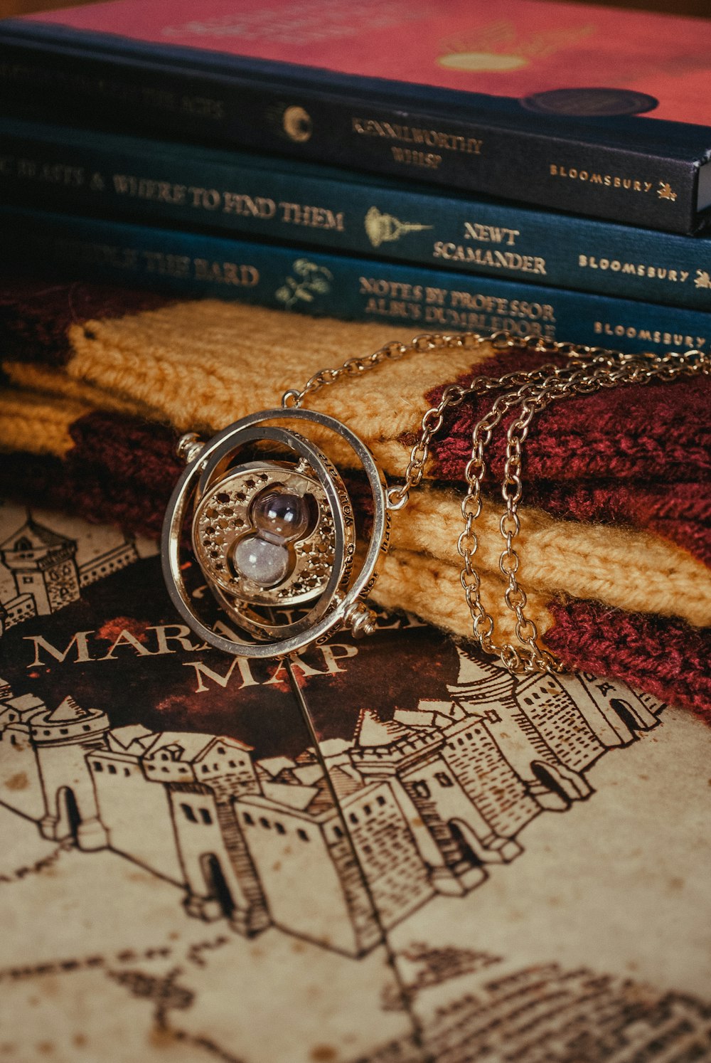 a close up of a necklace on a book