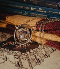 a close up of a necklace on a book