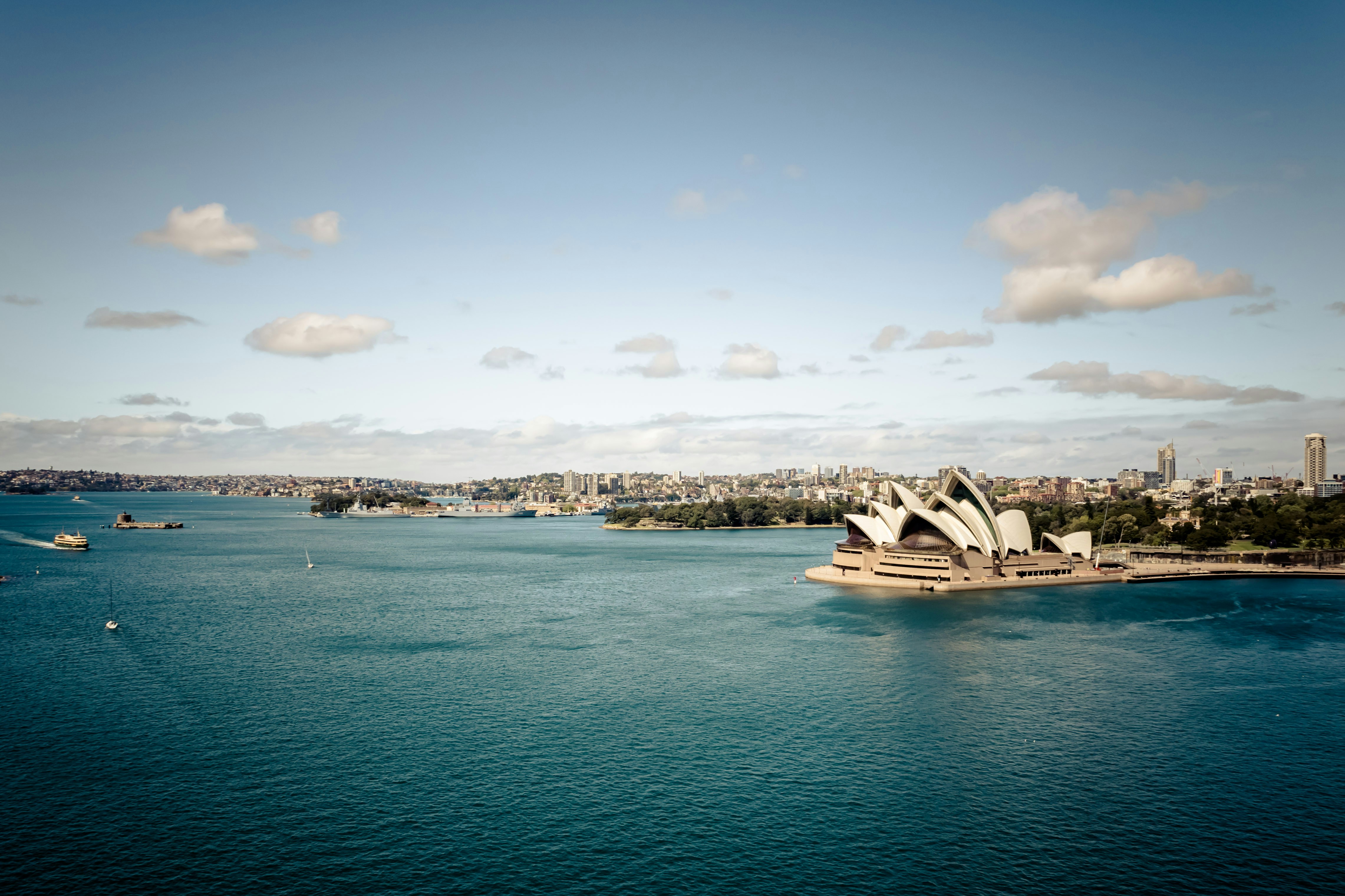 a large body of water with a large building in the middle of it