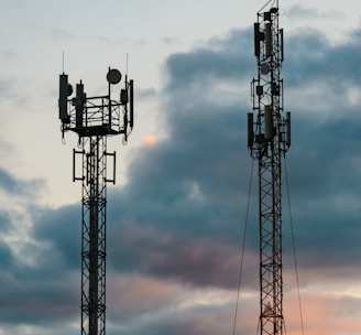 a couple of cell towers sitting next to each other
