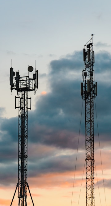 a couple of cell towers sitting next to each other