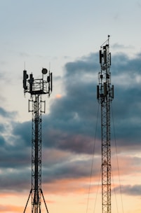 a couple of cell towers sitting next to each other