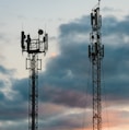 a couple of cell towers sitting next to each other