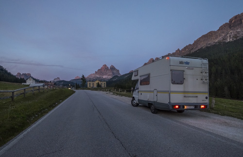 an rv parked on the side of a road