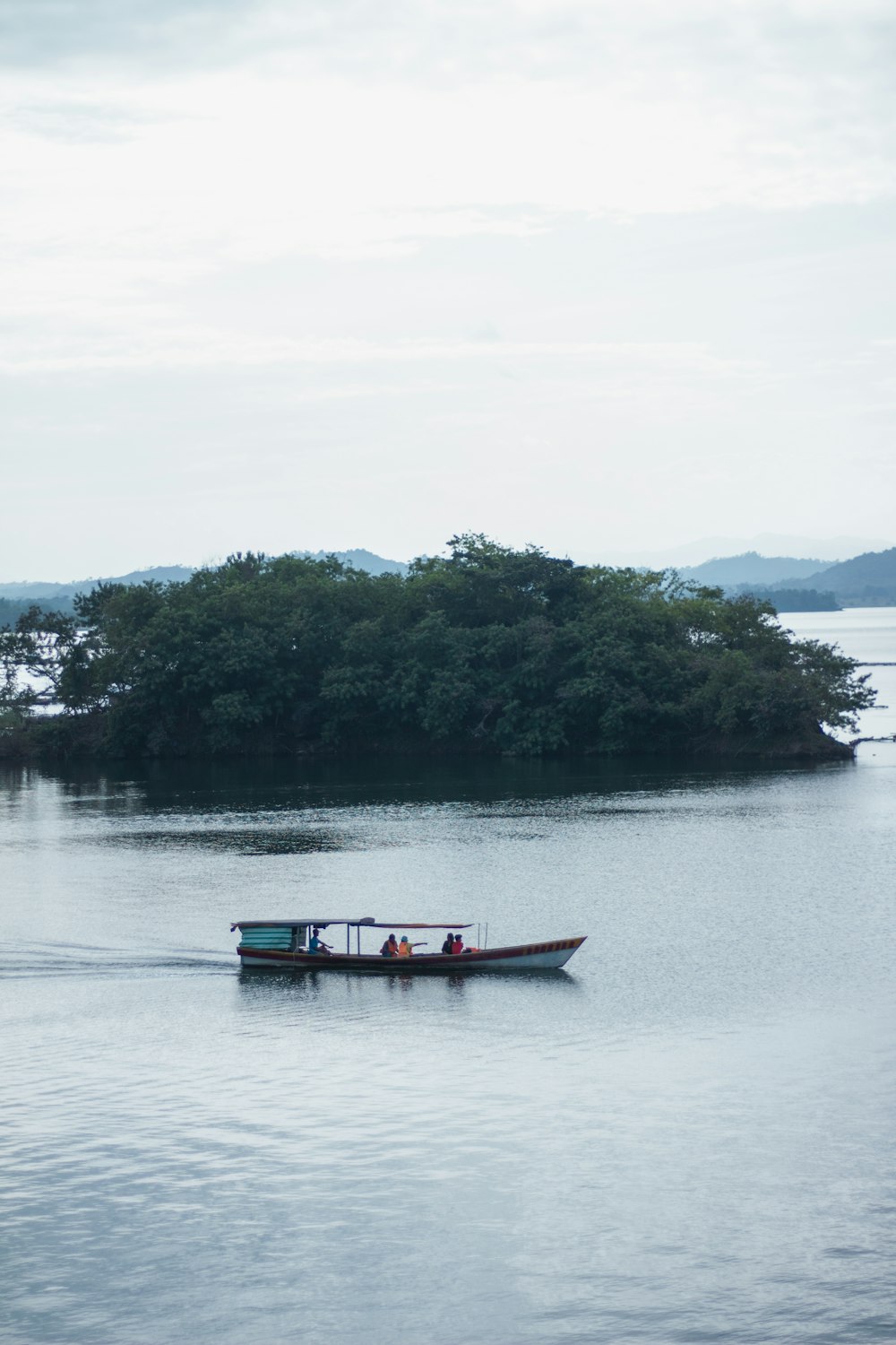 a small boat on a large body of water