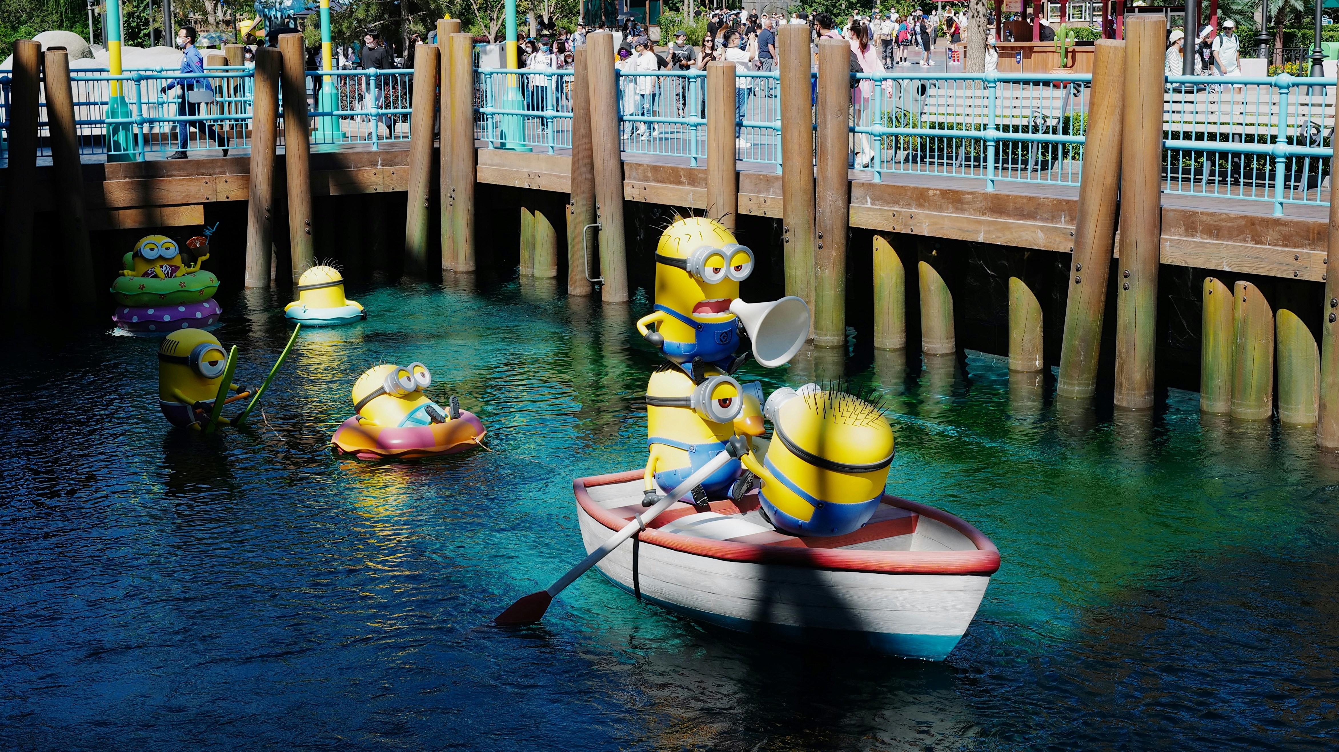 a group of people riding on top of a boat in a body of water