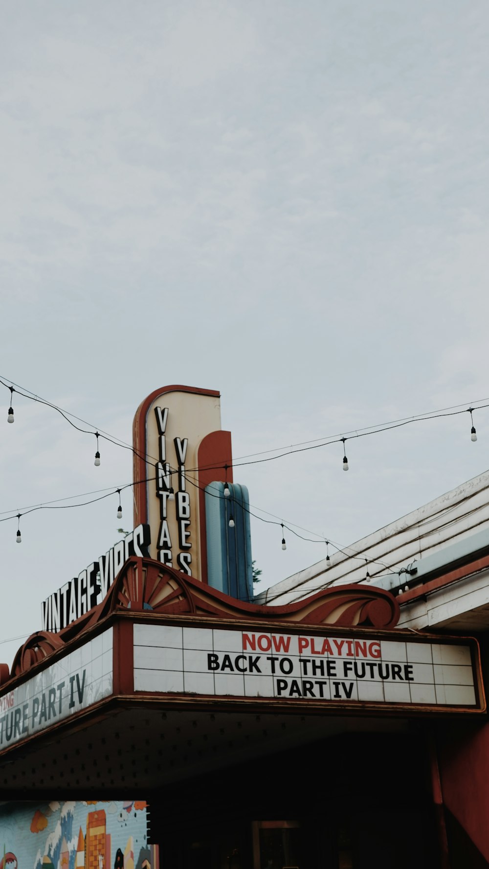 a theater marquee with a sign that says now playing back to the future