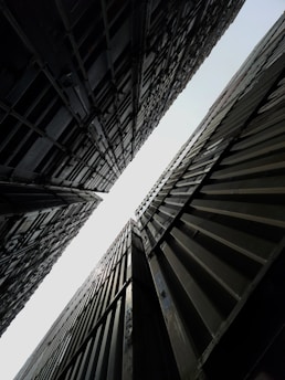 a couple of tall buildings next to each other