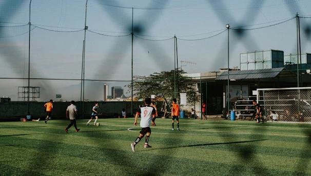 a group of people playing a game of soccer