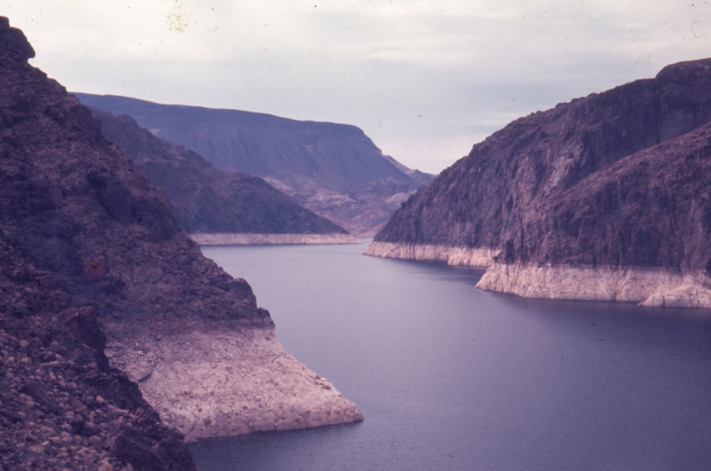 a large body of water surrounded by mountains