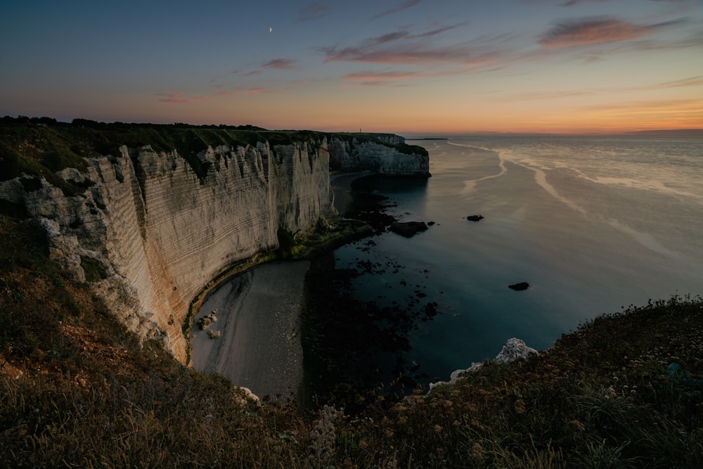 a view of the ocean from a cliff