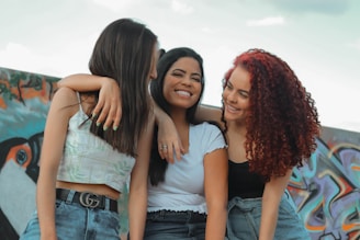 a group of young women standing next to each other