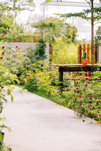 a garden filled with lots of different types of flowers