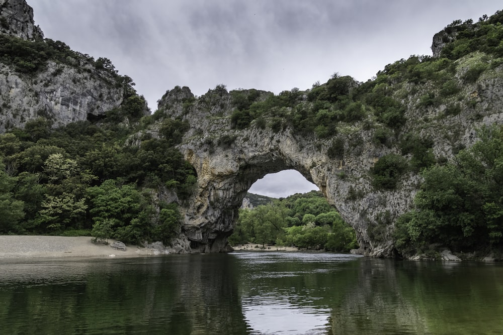 a large body of water with a bridge over it