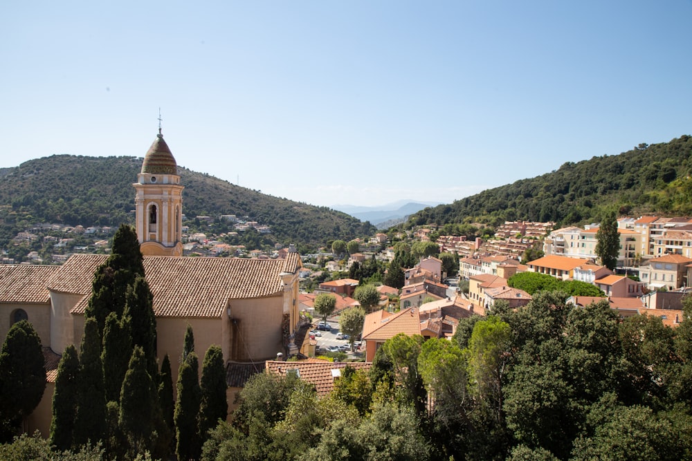 a view of a small town with a steeple