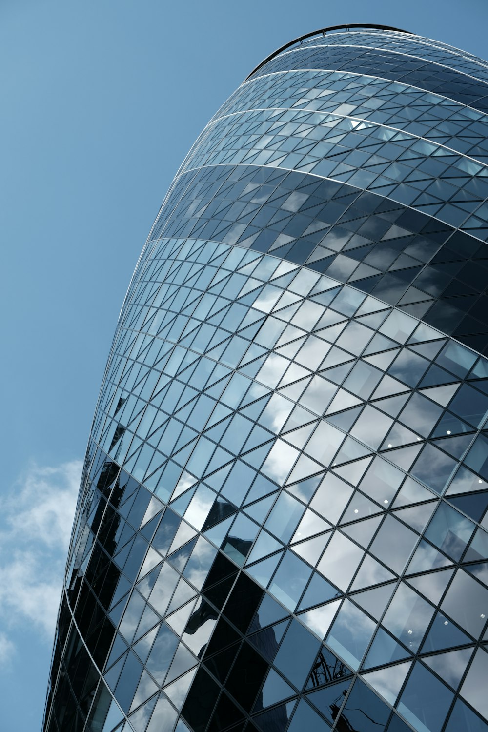 a very tall building with a sky background